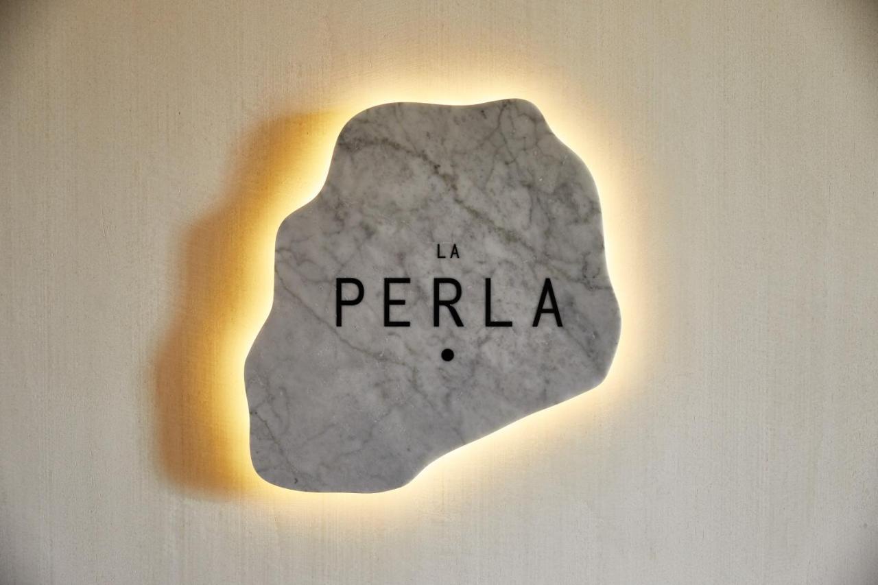 The Plaza Hotel Pioneer Park El Paso Luaran gambar La Perla logo